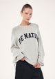 Grey marle crew neck knit sweater with dark chest text