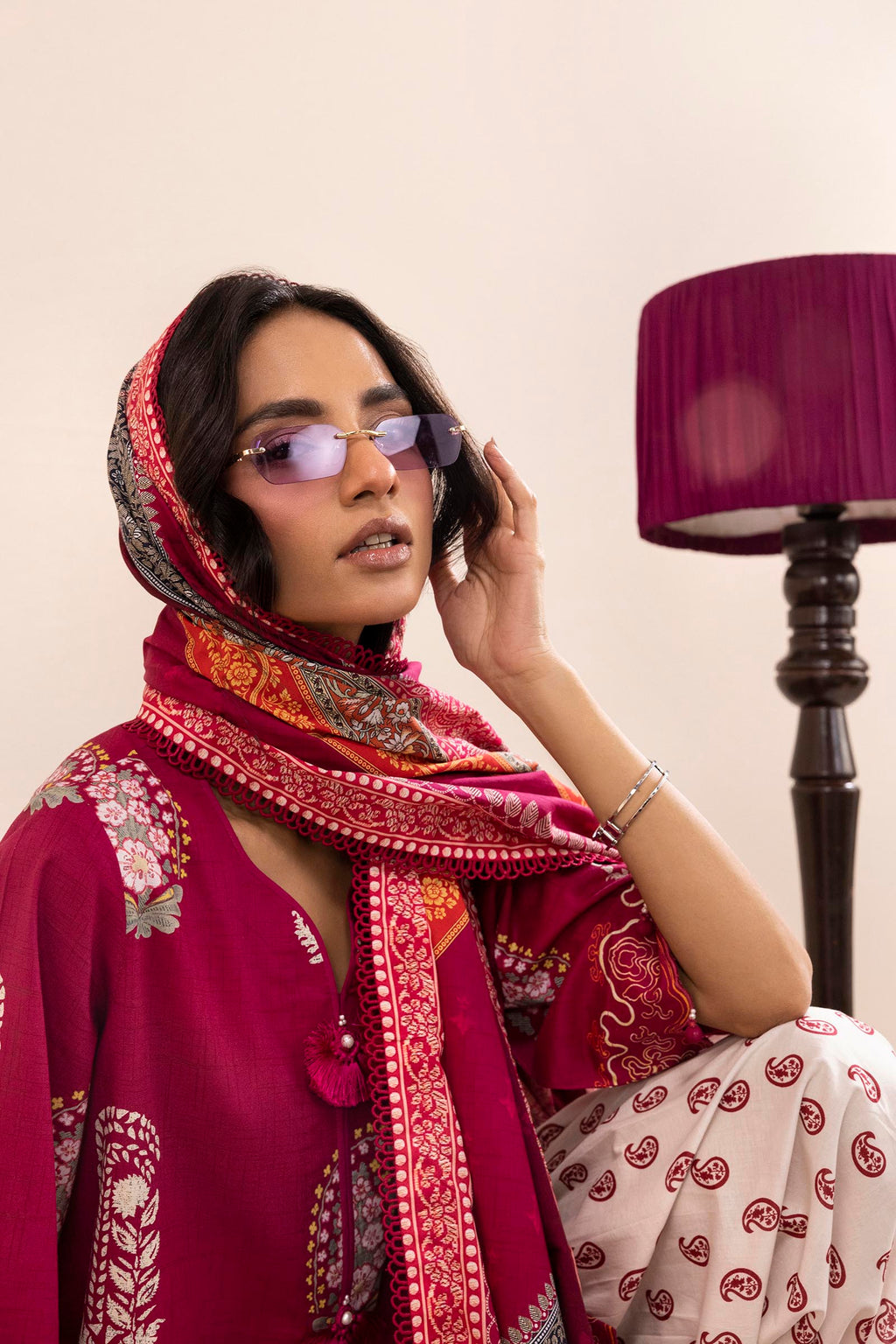 Women's multicoloured printed three-piece lawn suit with burgundy tunic, wide trousers and dupatta