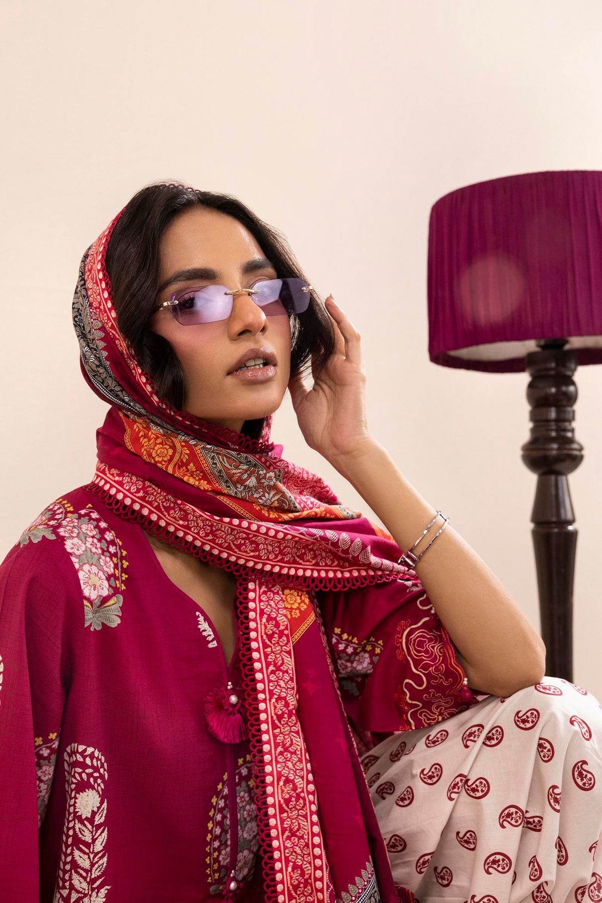 Women's multicoloured printed three-piece lawn suit with burgundy tunic, wide trousers and dupatta