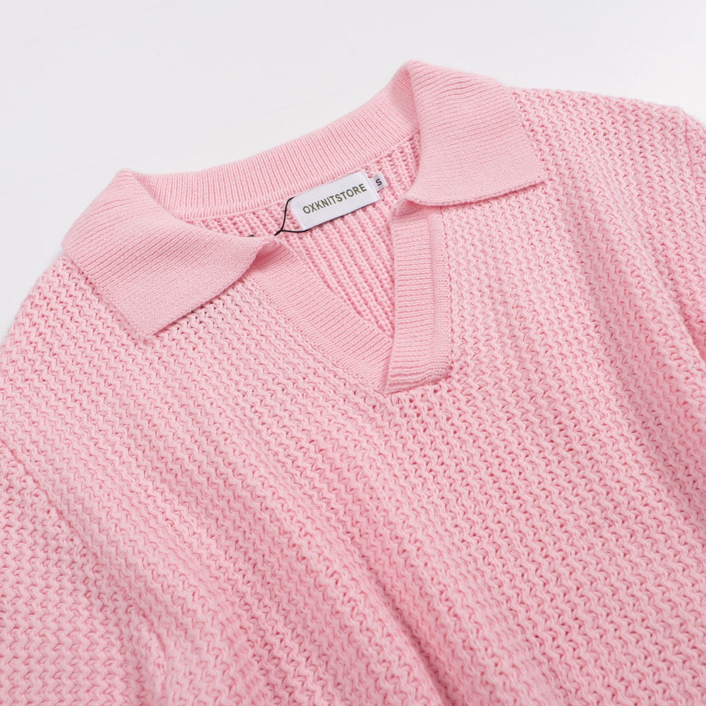 Men's pink waffle knit polo with V-neck collar