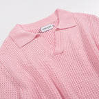 Men's pink waffle knit polo with V-neck collar