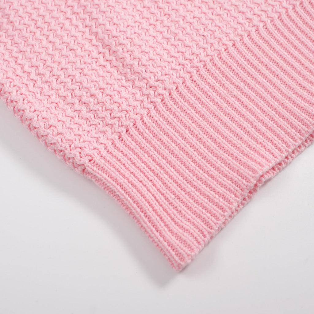 Men's pink waffle knit polo with V-neck collar