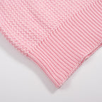 Men's pink waffle knit polo with V-neck collar
