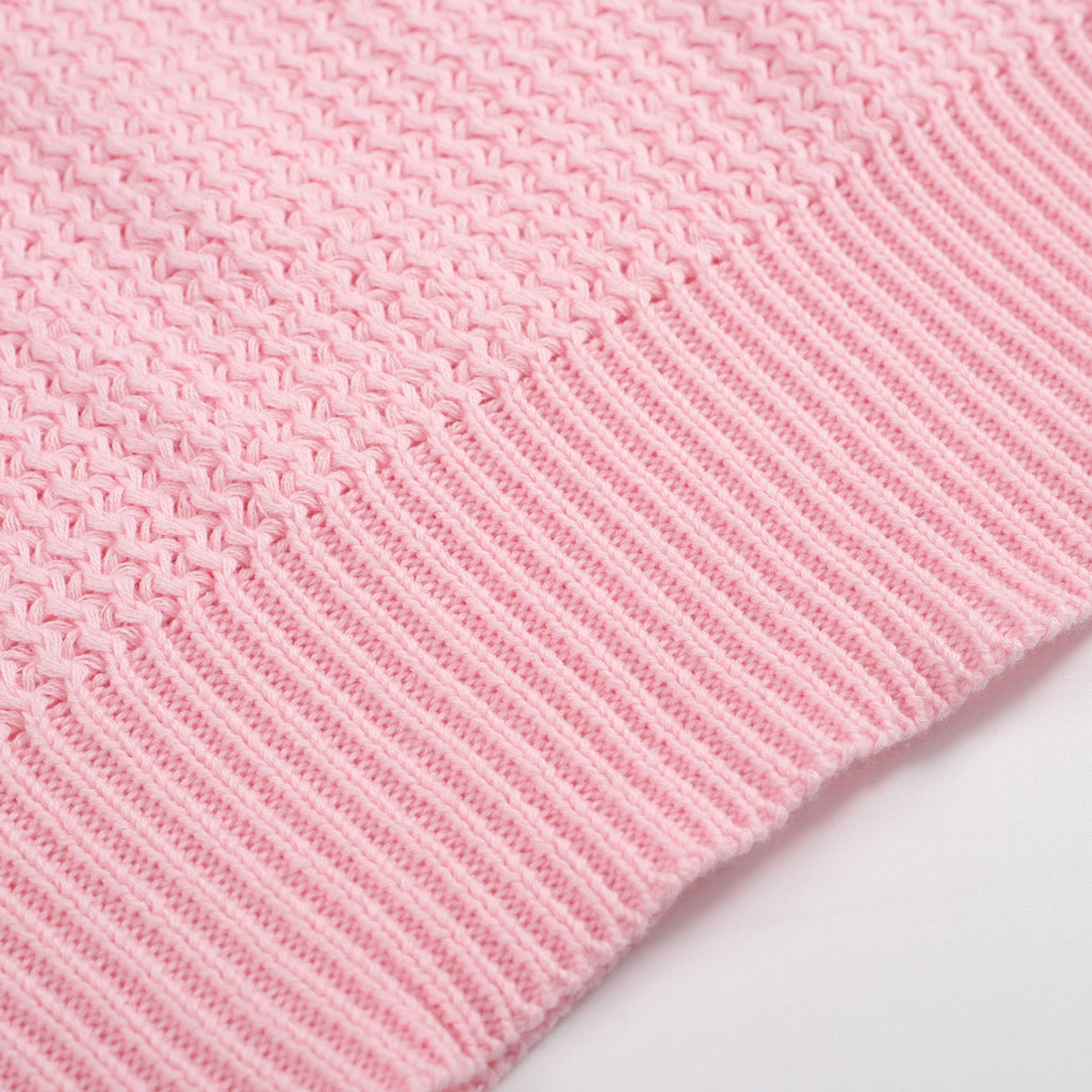 Men's pink waffle knit polo with V-neck collar