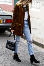 Women's velvet blazer with notched lapels and long sleeves