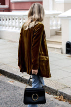 Women's velvet blazer with notched lapels and long sleeves