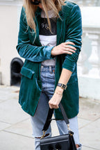 Women's velvet blazer with notched lapels and long sleeves