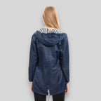 Women's hooded longline rain jacket with striped lining and zipped pockets