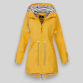Women's hooded longline rain jacket with striped lining and zipped pockets