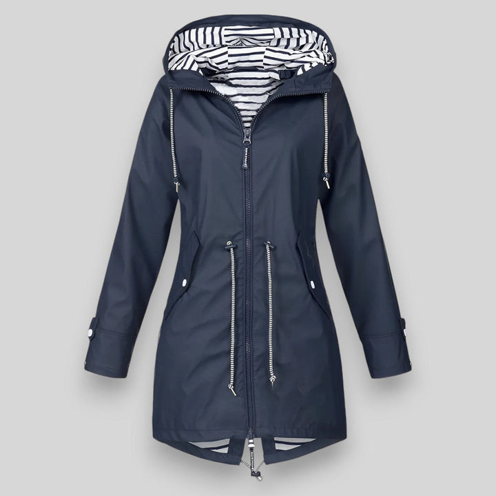 Women's hooded longline rain jacket with striped lining and zipped pockets