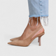 Women's pointed slingback high heels with slim straps and tall stiletto heels