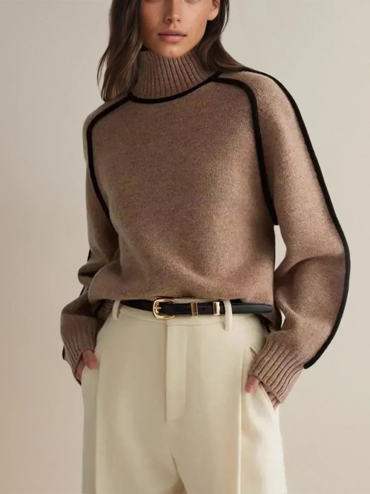 Women's oversized turtleneck sweater with contrasting trim and long sleeves
