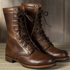 Unisex mid-calf lace-up combat boots with round toes and treaded soles