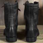Unisex mid-calf lace-up combat boots with round toes and treaded soles