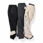 Women's quilted jogger trousers with drawstring waist, zipped pockets and ribbed ankle cuffs
