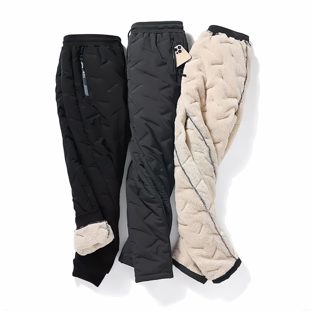 Women's quilted jogger trousers with drawstring waist, zipped pockets and ribbed ankle cuffs
