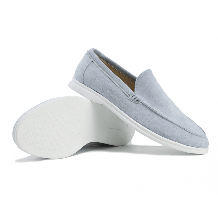 Men's textured slip-on loafers with moc toe stitching and flat soles