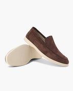 Unisex textured slip-on loafers with round toes and low wedge heels