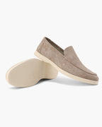 Unisex textured slip-on loafers with round toes and low wedge heels