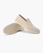 Unisex textured slip-on loafers with round toes and low wedge heels
