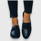 Women's black loafers with crocodile-effect toe panel