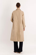 Women's long single-breasted trench coat with pointed collar and button front