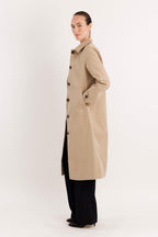 Women's long single-breasted trench coat with pointed collar and button front