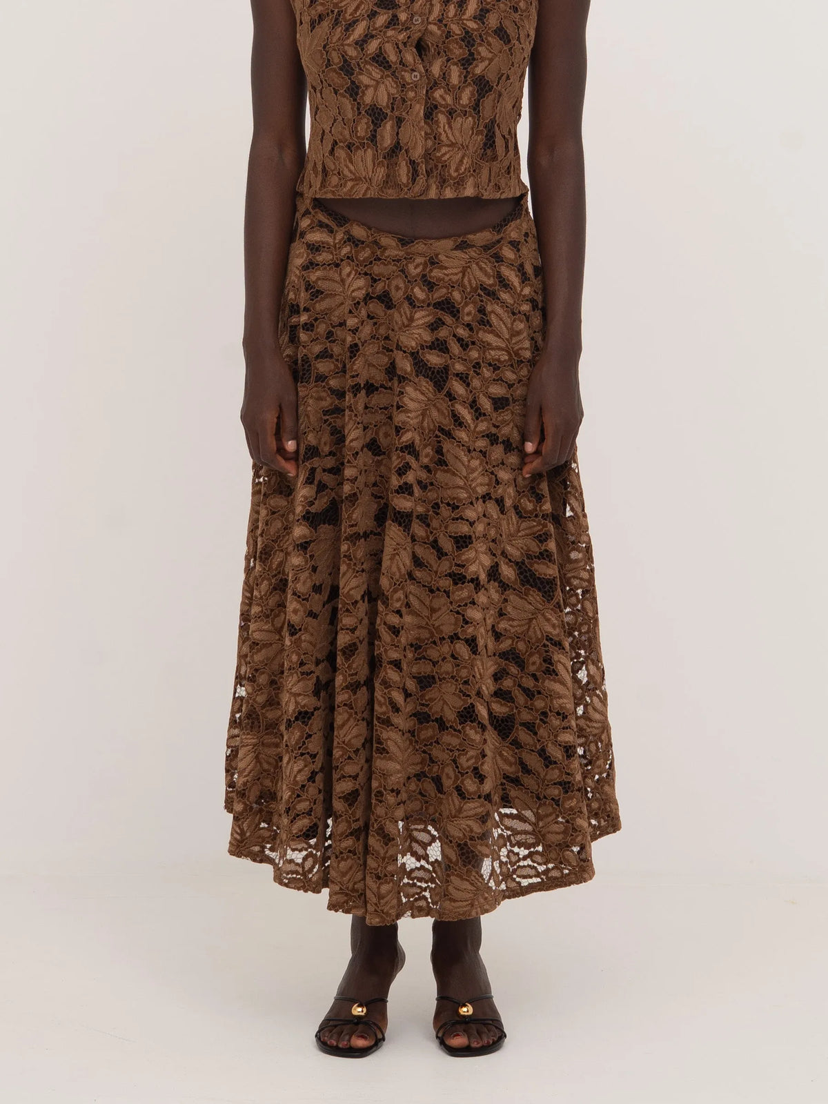 Women's brown floral lace midi skirt with flared silhouette