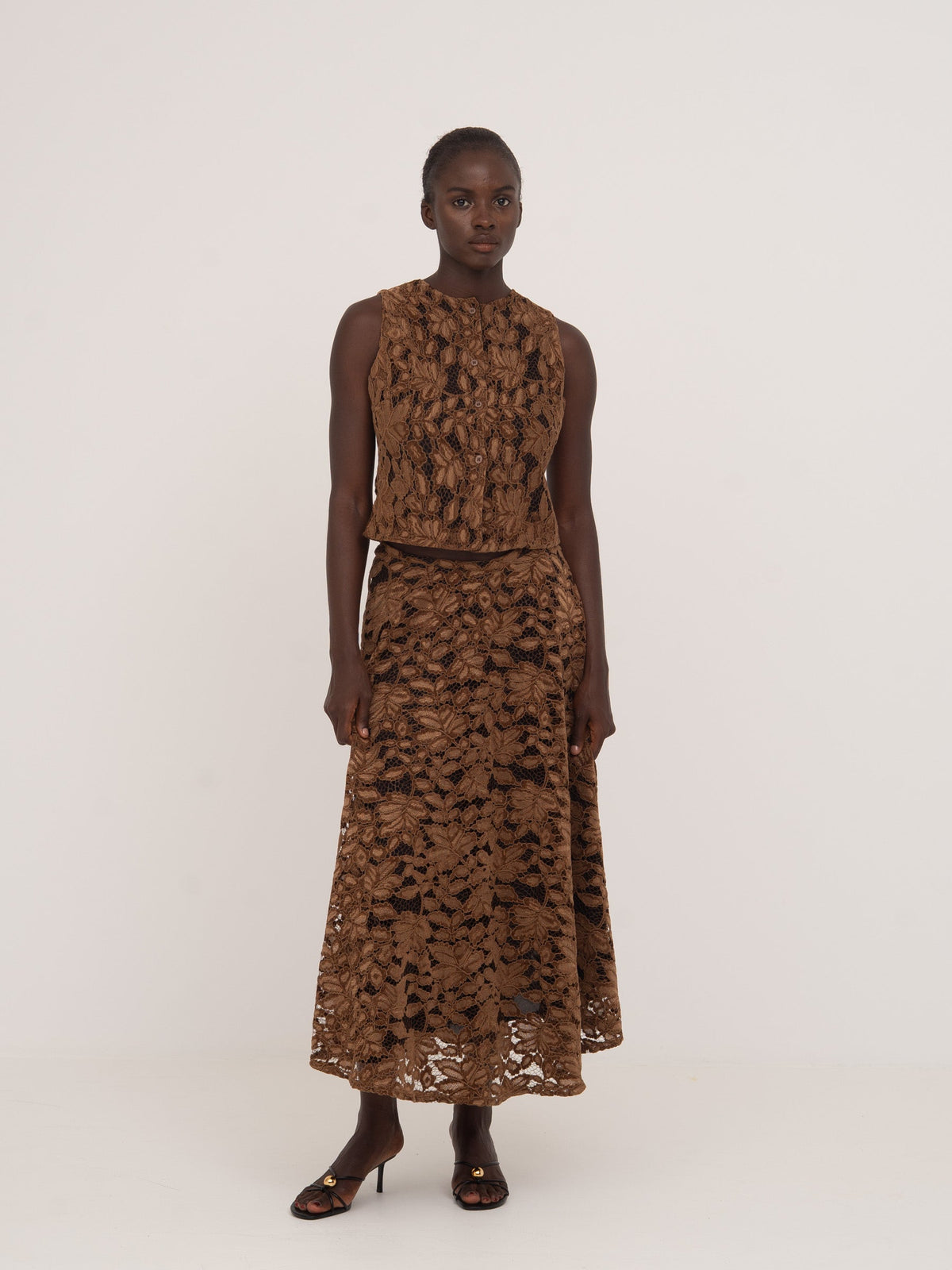 Women's brown floral lace midi skirt with flared silhouette