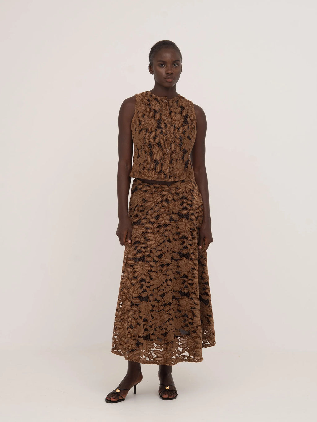 Women's brown floral lace sleeveless cropped top with front buttons