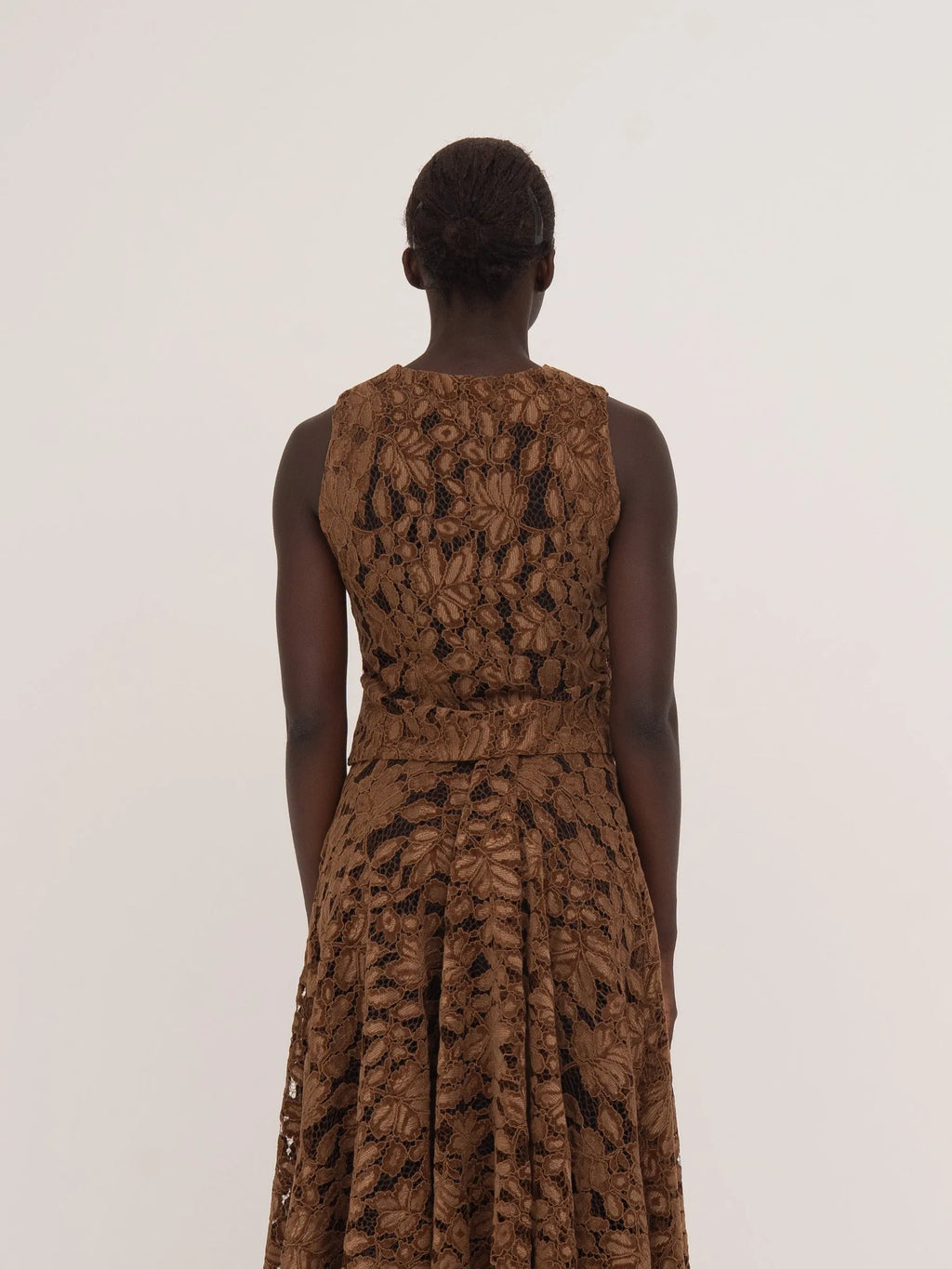 Women's brown floral lace sleeveless cropped top with front buttons