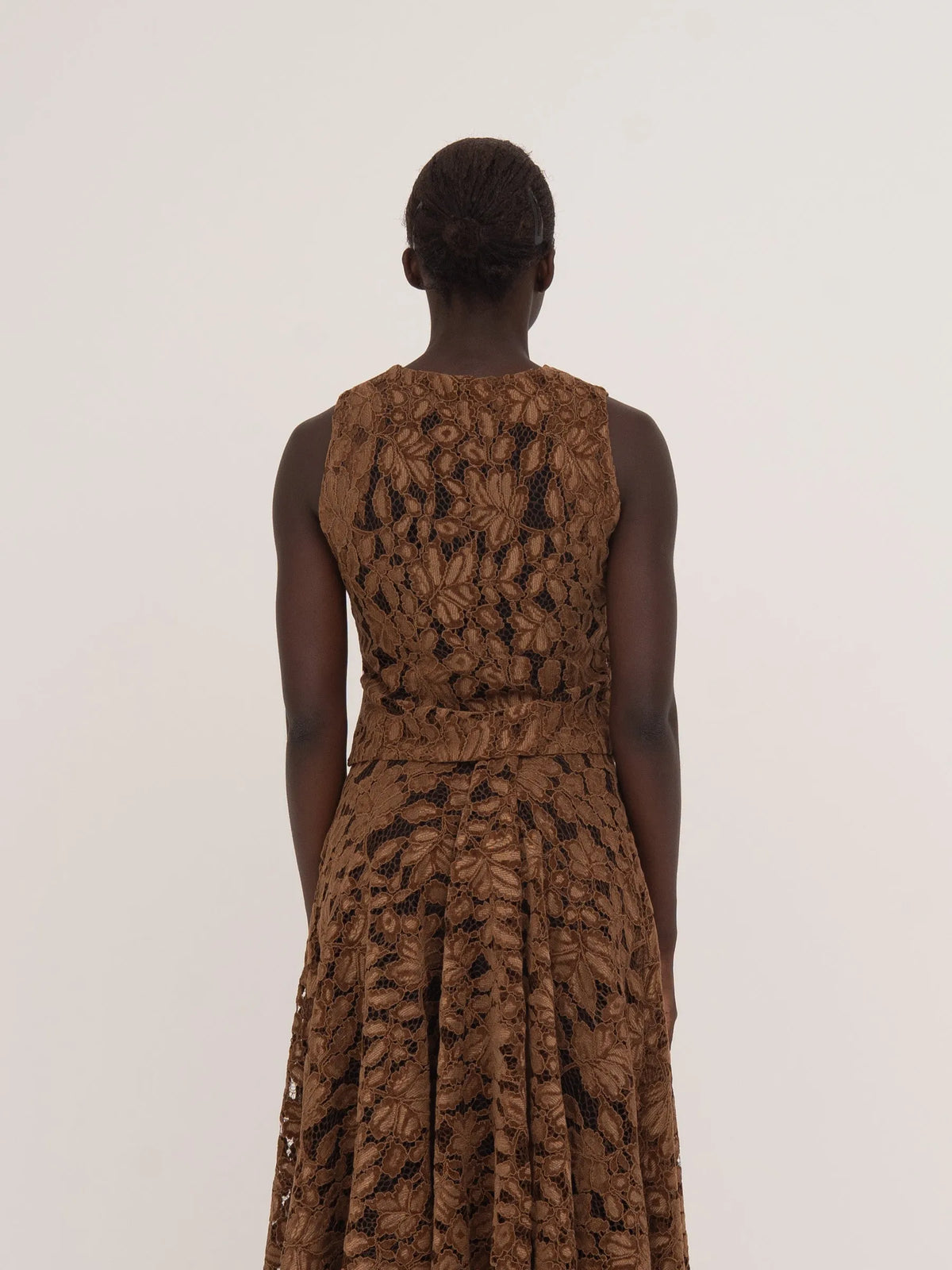 Women's brown floral lace sleeveless cropped top with front buttons