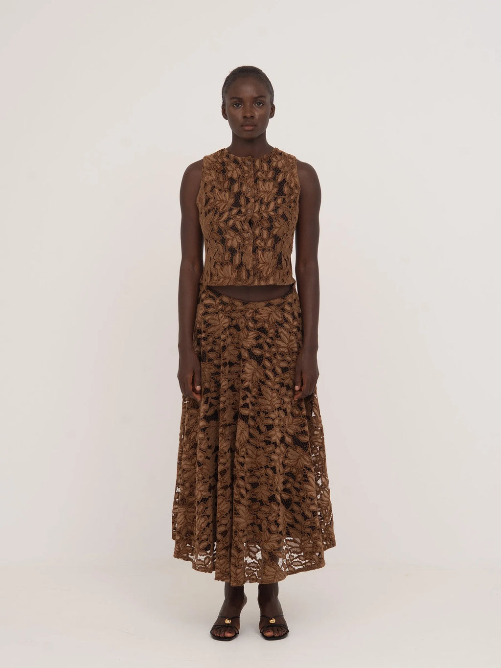 Women's brown floral lace sleeveless cropped top with front buttons