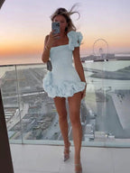 Women's strapless mini dress with floral appliqué and ruffle hem
