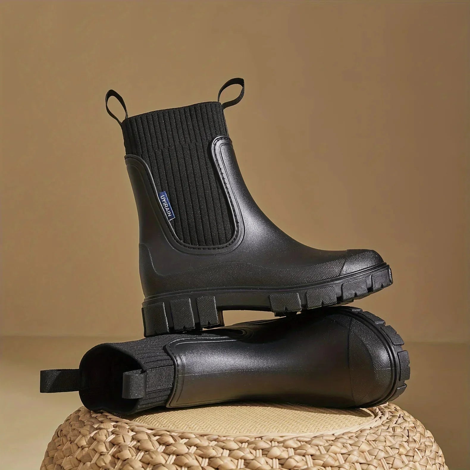 Women's Chelsea rain boots with elastic panels and chunky lug soles