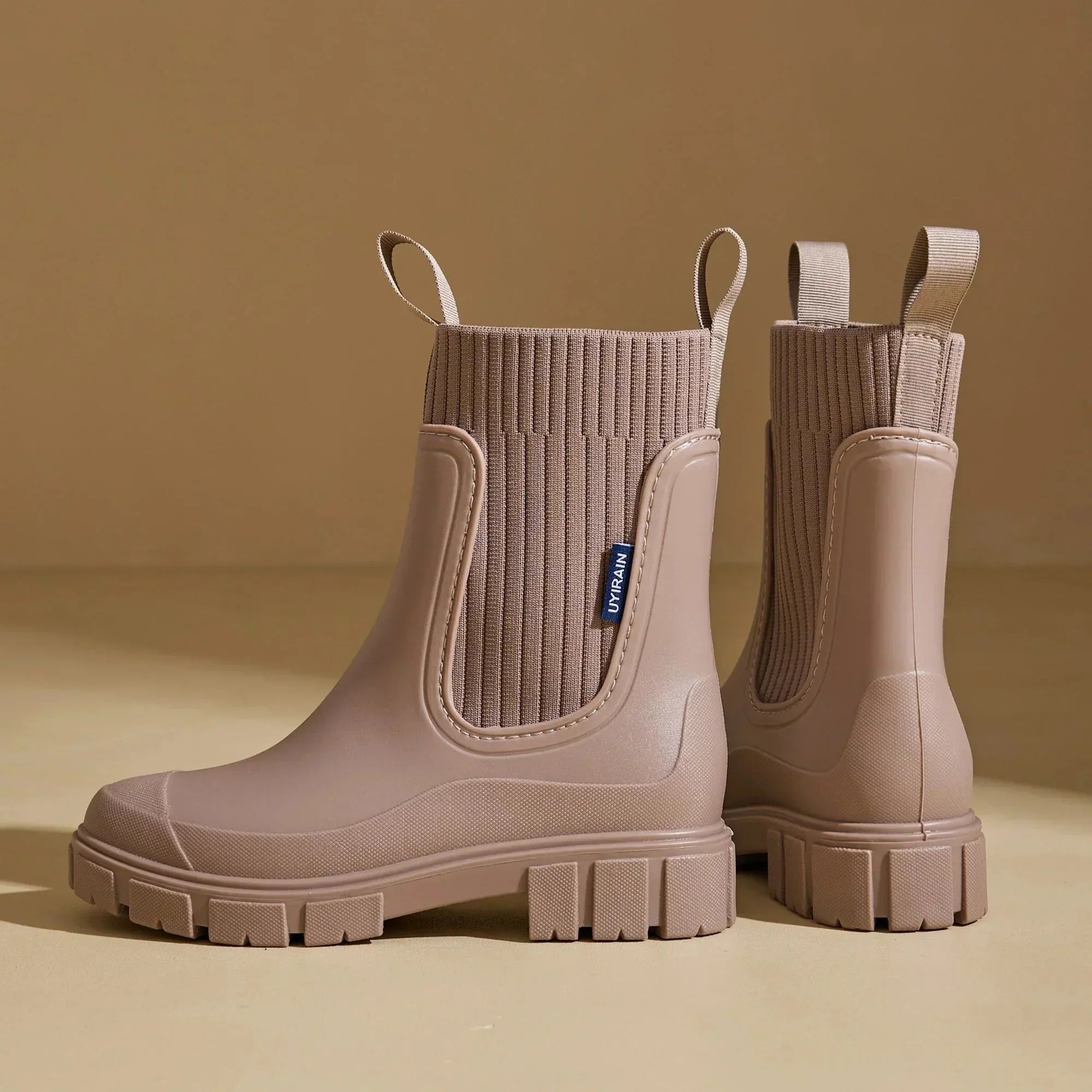 Women's Chelsea rain boots with elastic panels and chunky lug soles