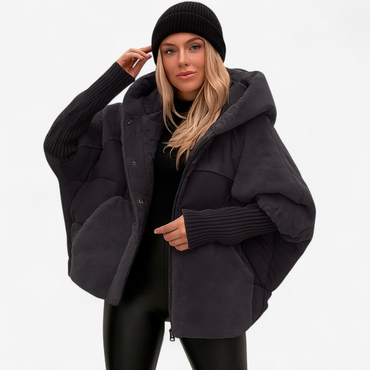 Women's oversized hooded quilted jacket with plush panels and ribbed cuffs