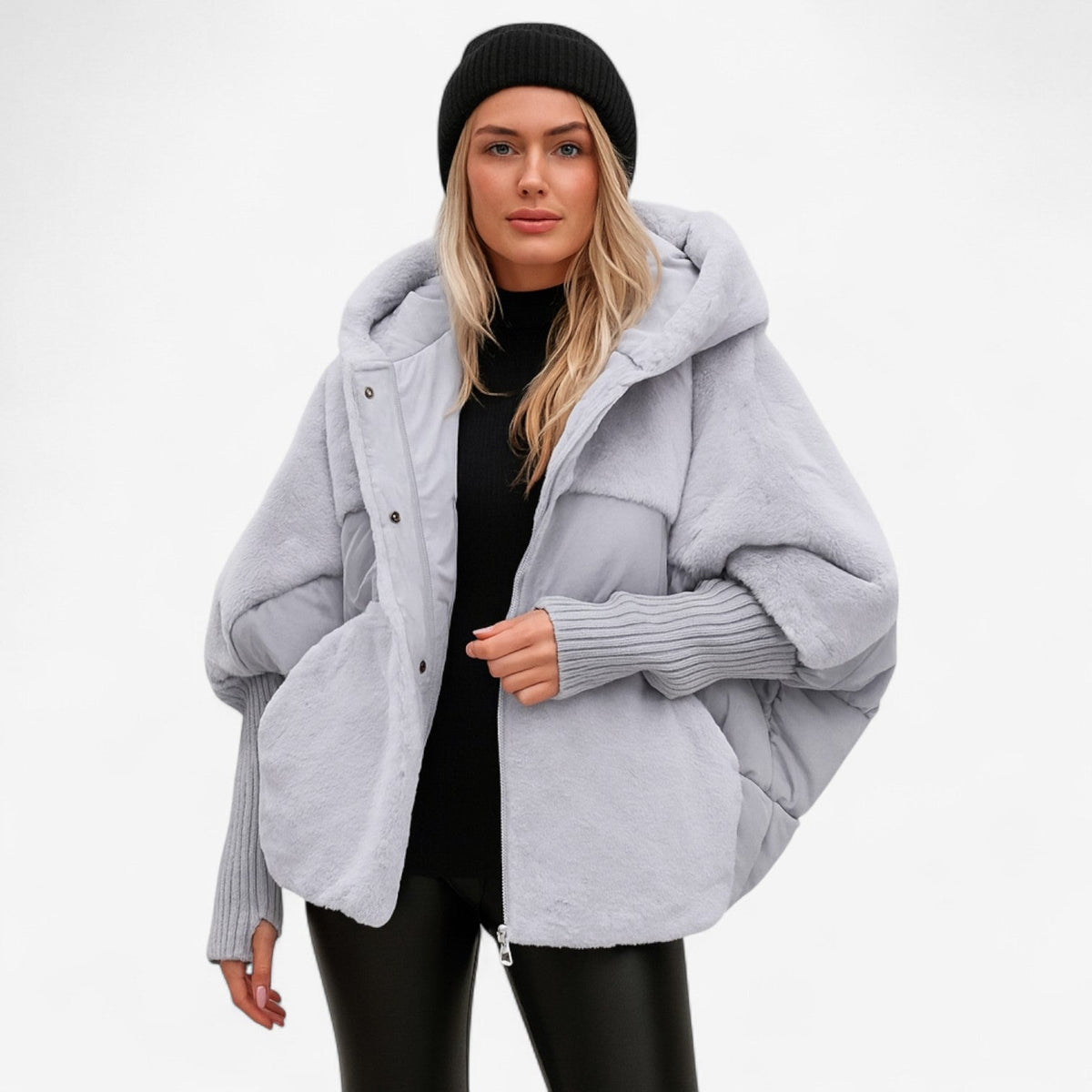 Women's oversized hooded quilted jacket with plush panels and ribbed cuffs