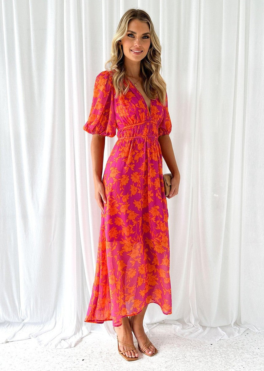 Women's pink and orange floral midi dress with puff sleeves