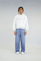 Unisex hooded sweatshirt with long sleeves, front pouch pocket and chest logo details