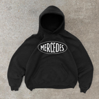 Black pullover hoodie with white Mercedes chest graphic and kangaroo pocket