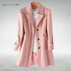 Women's longline trench coat with notched lapels, button front and long sleeves
