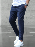 Men's slim fit jogger pants with drawstring waist and tapered cuff in grey