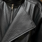 Women's black leather biker jacket with asymmetric zip and high collar