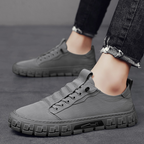 Low top lace-up sneakers with textured flat soles