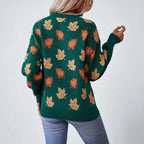 Women's crew neck sweater with repeated maple leaf pattern and long sleeves