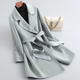 Women's belted trench coat with notched lapels, contrast piping and long sleeves