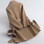 Women's belted trench coat with notched lapels, contrast piping and long sleeves