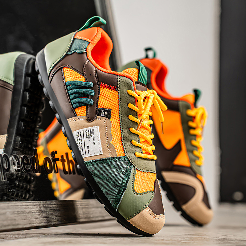 Colourblock utility trainers with layered panels and lace-up fronts