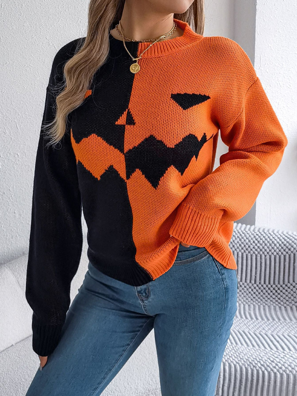 Women's graphic knit sweater with crew neckline and ribbed trims